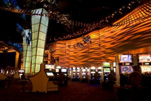 LED accent strip lights in a casino accenting walls and architectural elements. Boca Lighting and Controls.