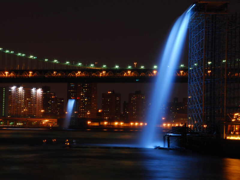 Exterior architectural accent lighting fixtures at New York waterfall feature.