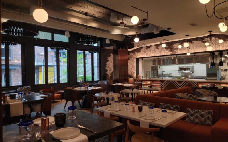 LED cove and under-cabinet lighting in Astra Hotel's restaurant