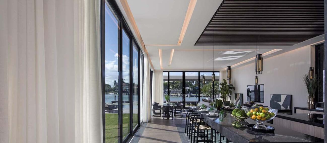 LED cove lighting fixtures in a modern residential kitchen and dining area.