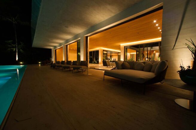 Linear LED cove lighting and accent lighting in a residential indoor/outdoor space.