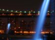 Illuminated waterfall fountains flanking the Brooklyn Bridge