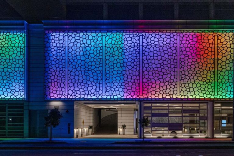 New Hotel Earns Praise for Forward-Thinking Design The colorful, illuminated facade of the Luma Hotel