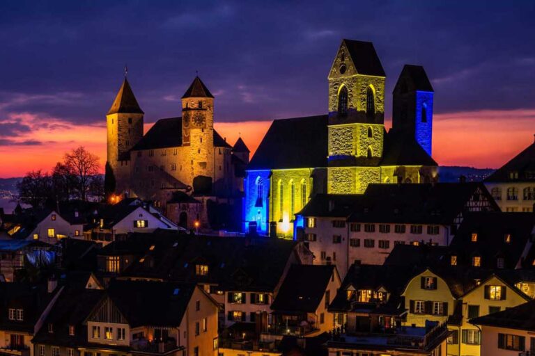Exterior building facades washed in vibrant blue and yellow color