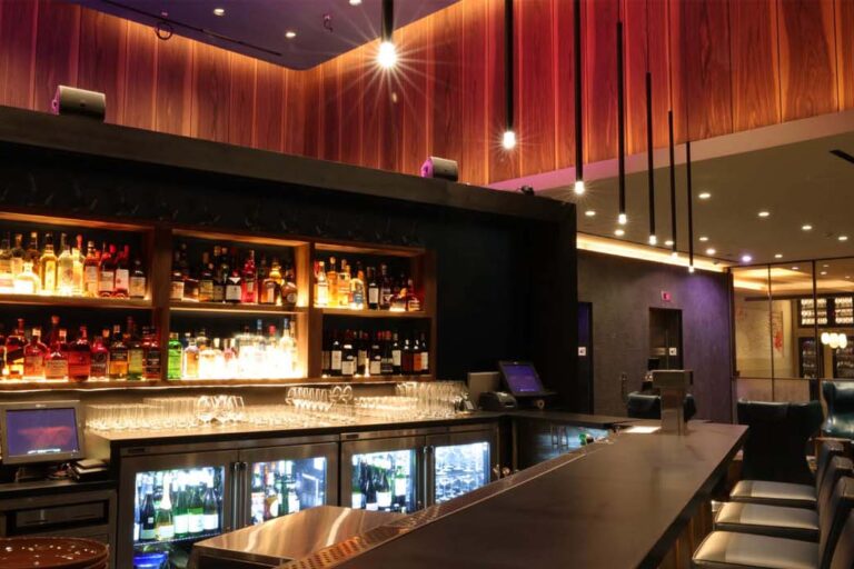 Create Stunning Visual Spaces with Wall Washing and Wall Grazing Light Wall washing LED lighting in a hotel bar