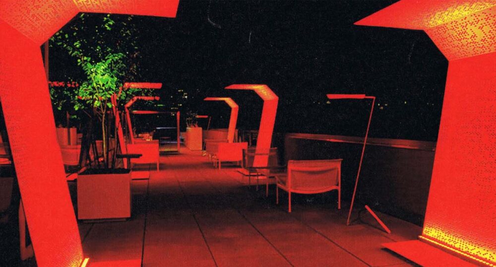 How Wireless DMX Orchestrates Architectural Lighting Scenes Without Cables Vibrant red lighting on a patio