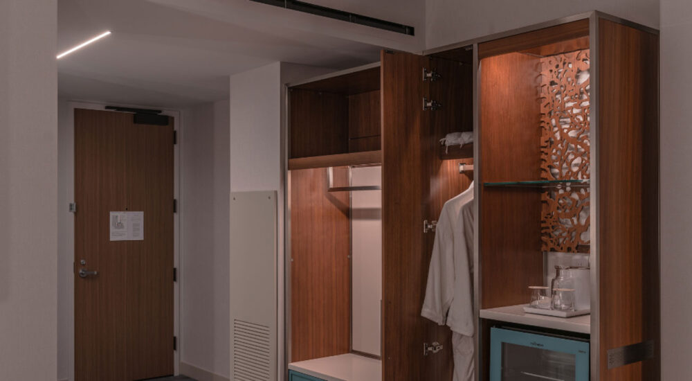 Under cabinet fixtures in a hotel guest room