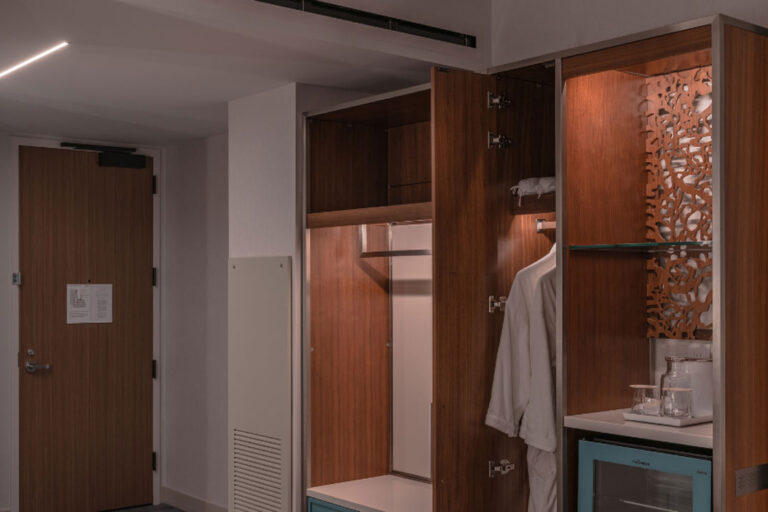 Under cabinet fixtures in a hotel guest room